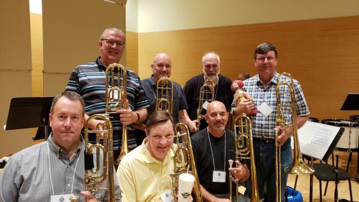 Trombones: Robert Fleming, David Read, Carl Trevathan, (back row) Bryan Corbett, Mike Engstrom, Kim Scharnberg, Mitch Kaufman Trombones