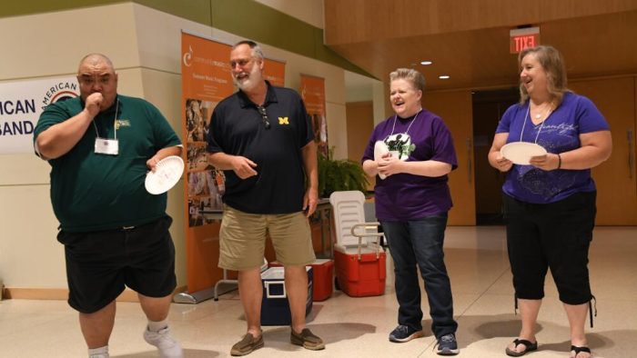 Allen Carter receives his "Paper Plate Award" presented by Pete Goodman, Donna O'Bryant ,and Donna Bennett Allen Carter receives his "Paper Plate Award"