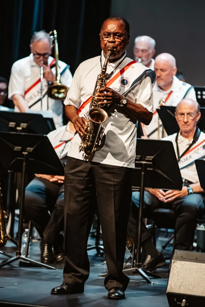 Charlie Young playing saxophone